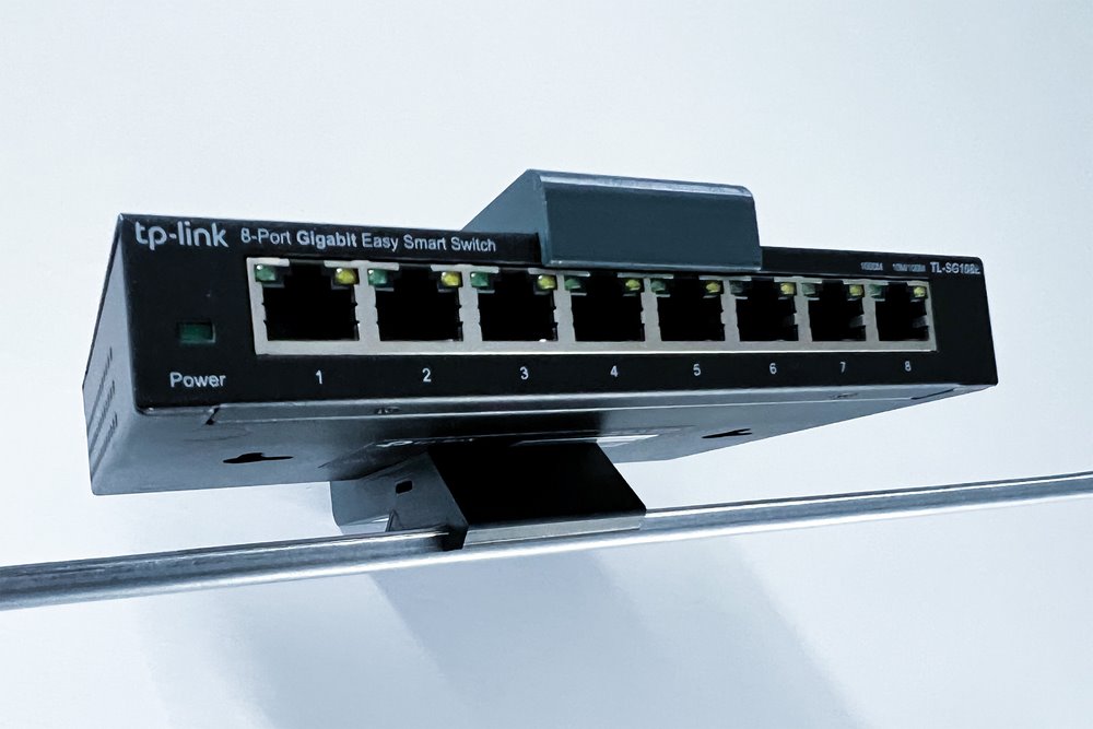 TP-LINK Držák na DIN lištu D-TPDIN158, pro SG108xx, SF1006P, ER605, RP108GE, šedý