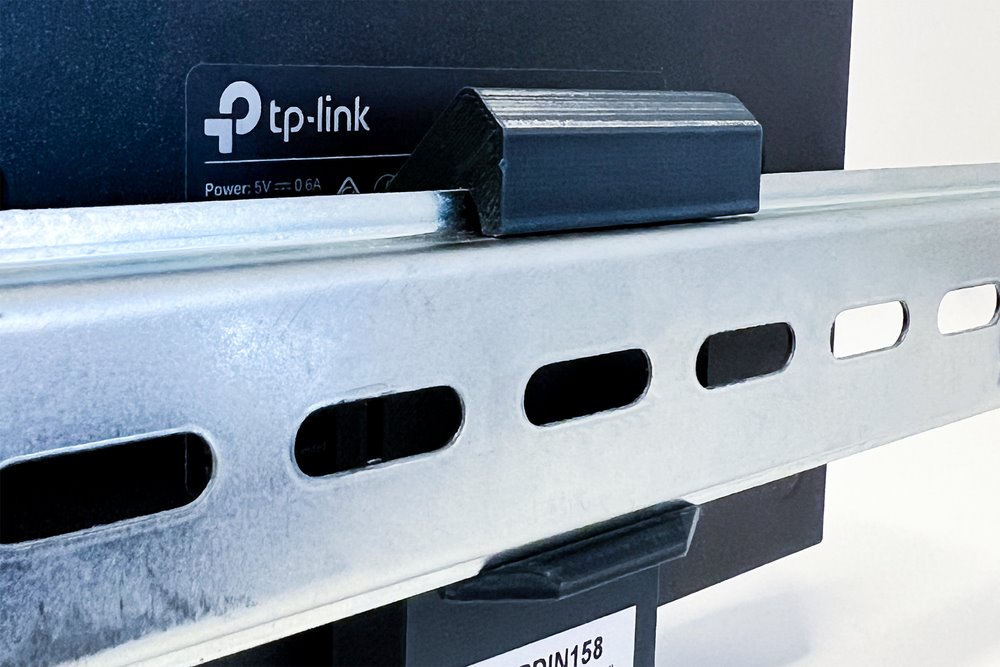 TP-LINK Držák na DIN lištu D-TPDIN158, pro SG108xx, SF1006P, ER605, RP108GE, šedý