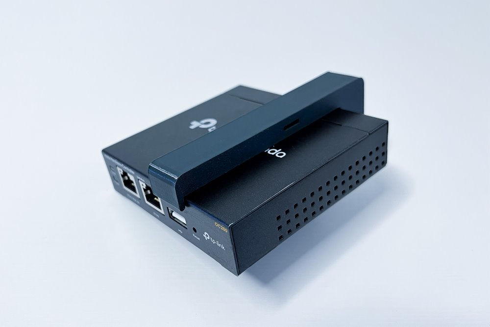 TP-LINK Držák na DIN lištu D-TPDIN100, pro OC200, SF1005xx, SG105xx, SG1005xx, šedý