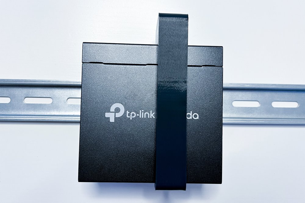 TP-LINK Držák na DIN lištu D-TPDIN100, pro OC200, SF1005xx, SG105xx, SG1005xx, šedý