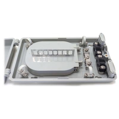 XtendLan plastový rozvaděč pro 12 svarů, 12 pigtailů, 2 kabelové porty, odklopná dvířka